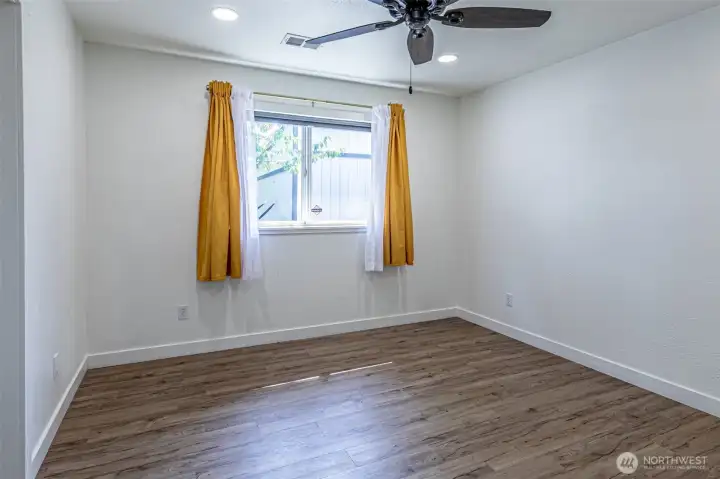 Bedroom #2 has window treatmenst & ceiling fan.