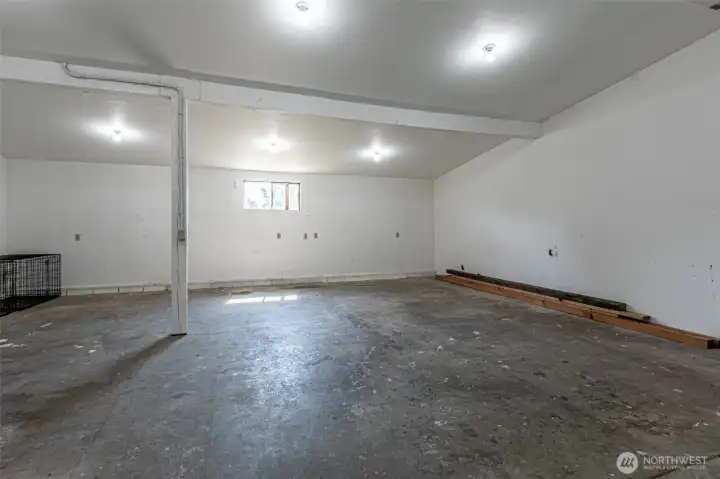 This is the shop area that is attached to the 4 car garage.