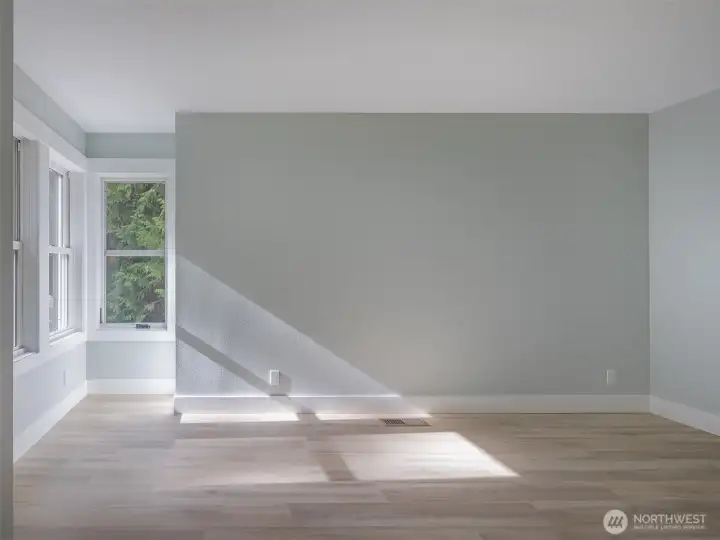 2nd bedroom with sunny area for a desk or daybed.