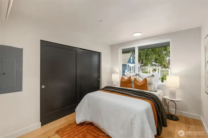 Wake up to soft light and clean lines in this tranquil space, designed for everyday ease.