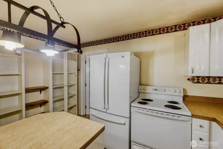 Your kitchen view from the dishwasher and sink.