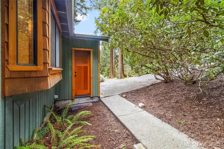 Walkway to front driveway.