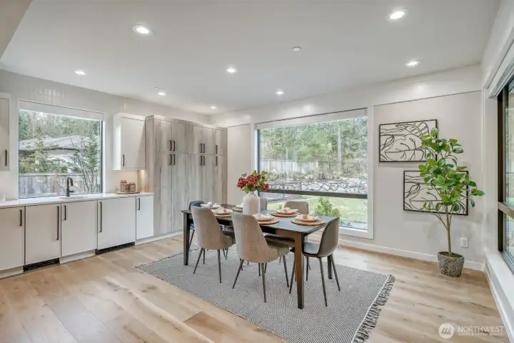 Dining area with wet bar/covert ice maker & beverage fridge/pantry cabinets and pull out shelving