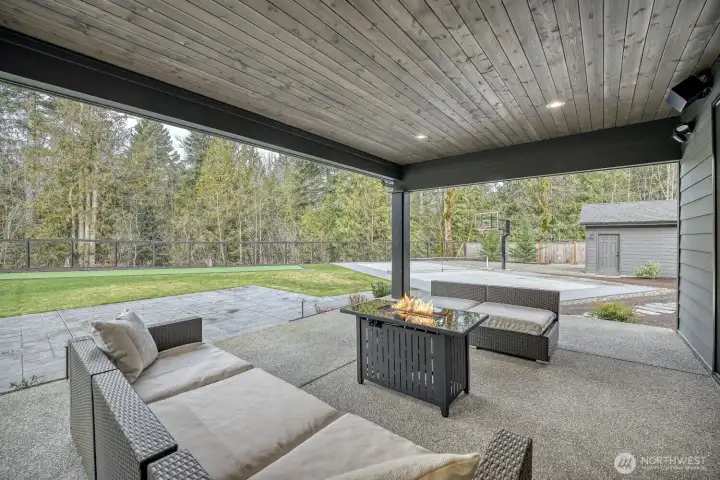 Year around enjoyment on your covered patio in backyard with gas plumbing and outdoor speakers