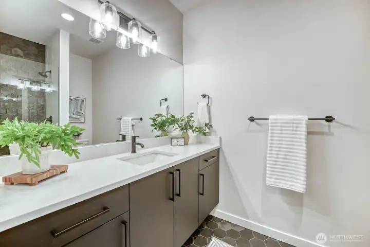 Main floor 2nd primary bedroom with 3/4 bathroom