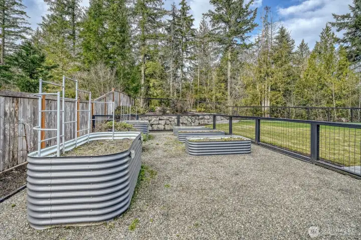 Eat what you grow in this glorious garden area with raised garden beds and irrigation