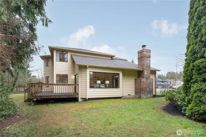North side of the yard. The large window is in the dining room.