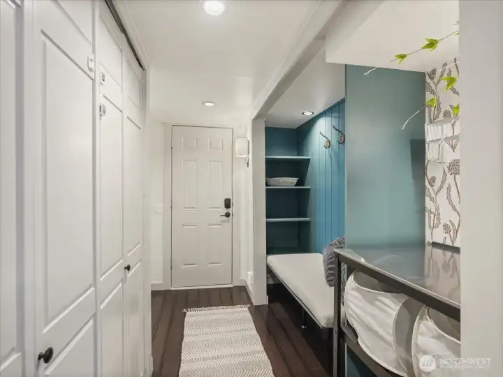 Added shelving for convenient storage and the door leads to the garage.