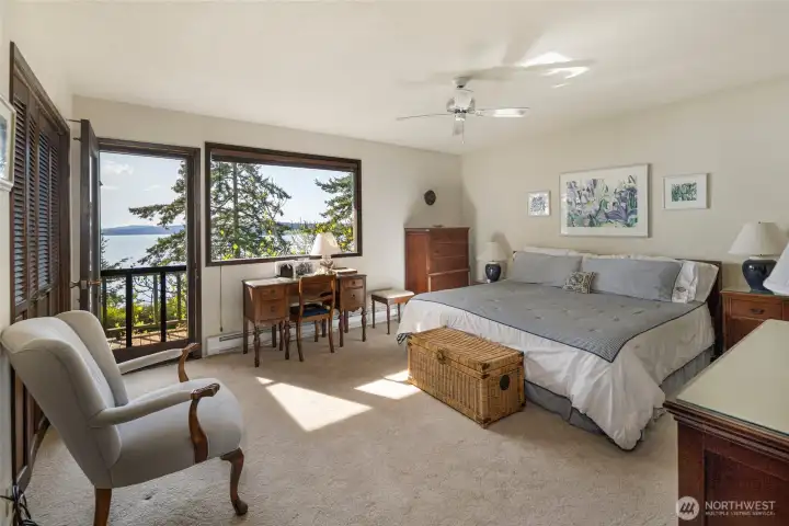 Primary bedroom with front porch access.