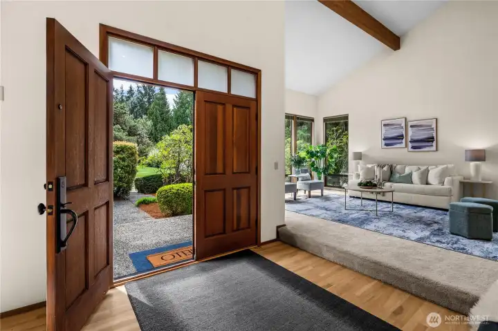 Gazing out from the entry, you will be impressed with meticulously manicured landscaping. Upon entering, a light and bright two-story foyer will entice you in further. The open floor plan features hardwood floors flowing throughout the main level