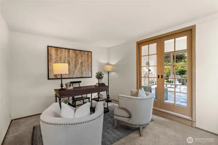 Is it a den?  home office? ...or can it be reimagined as a lounge area complete with a wet bar?