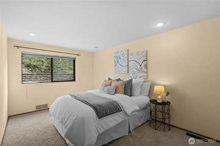 Bedroom 3. Another spacious room with views of the surrounding landscpae.