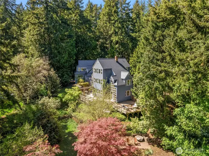 Welcome to tranquil Island living on 1.32 acres with territorial views.