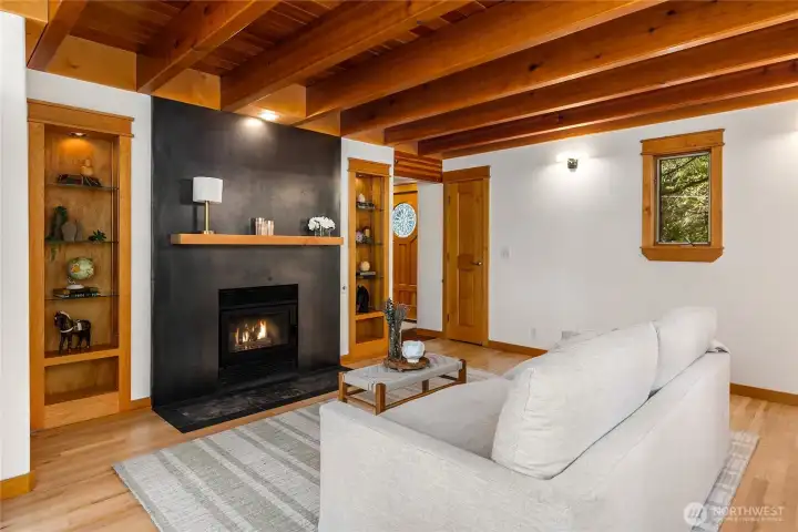 ...opening to interiors with hardwoods, solid wood doors, rich trim, and detailed built-ins.