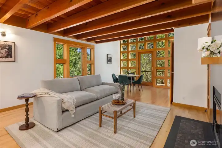 Sunlit, south-facing windows fill the home with natural light.