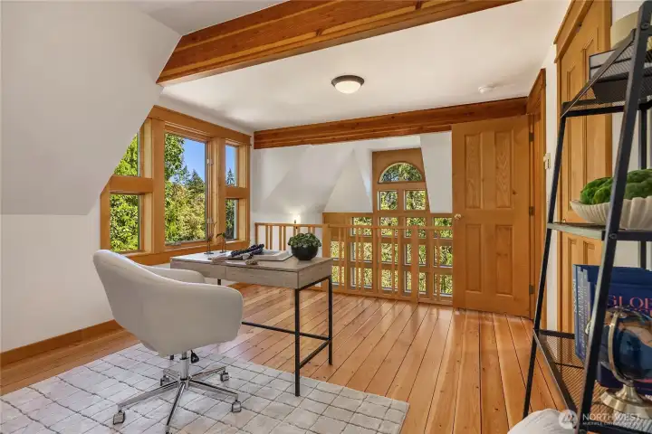 You'll also find a delightful den/office loft on the second floor.