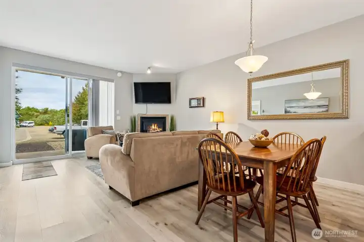 Open living room leads to private back patio