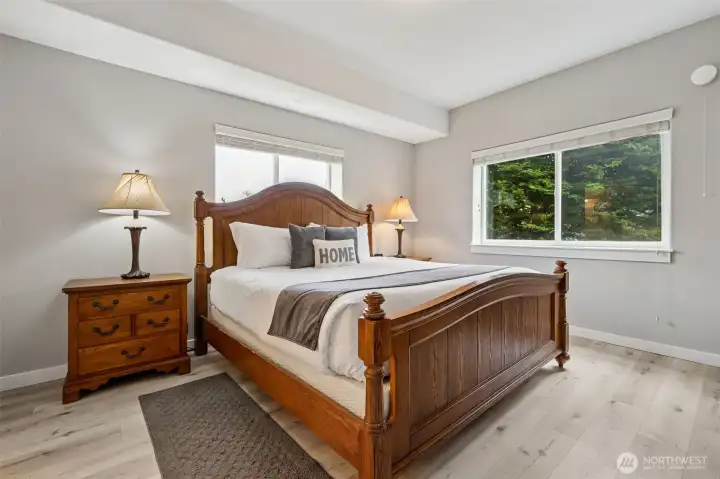 Spacious primary suite off of the living room