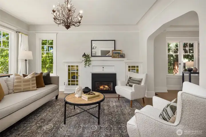 Formal living room with gas fireplace.