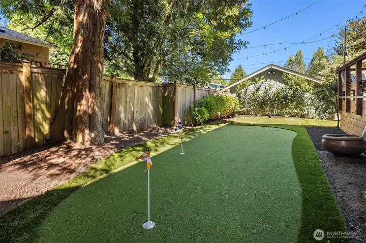 Your very own turf putting green on one side of home.