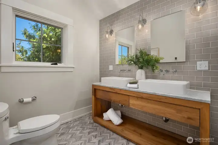 Primary bathroom with double sinks.