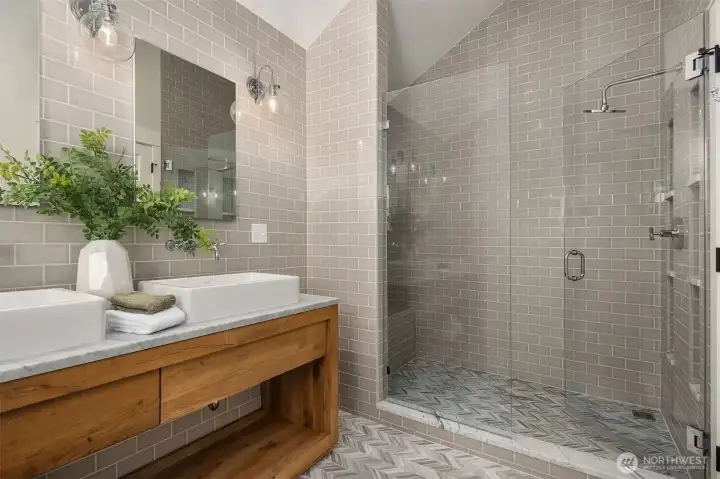 Primary bathroom with large walk-in shower.