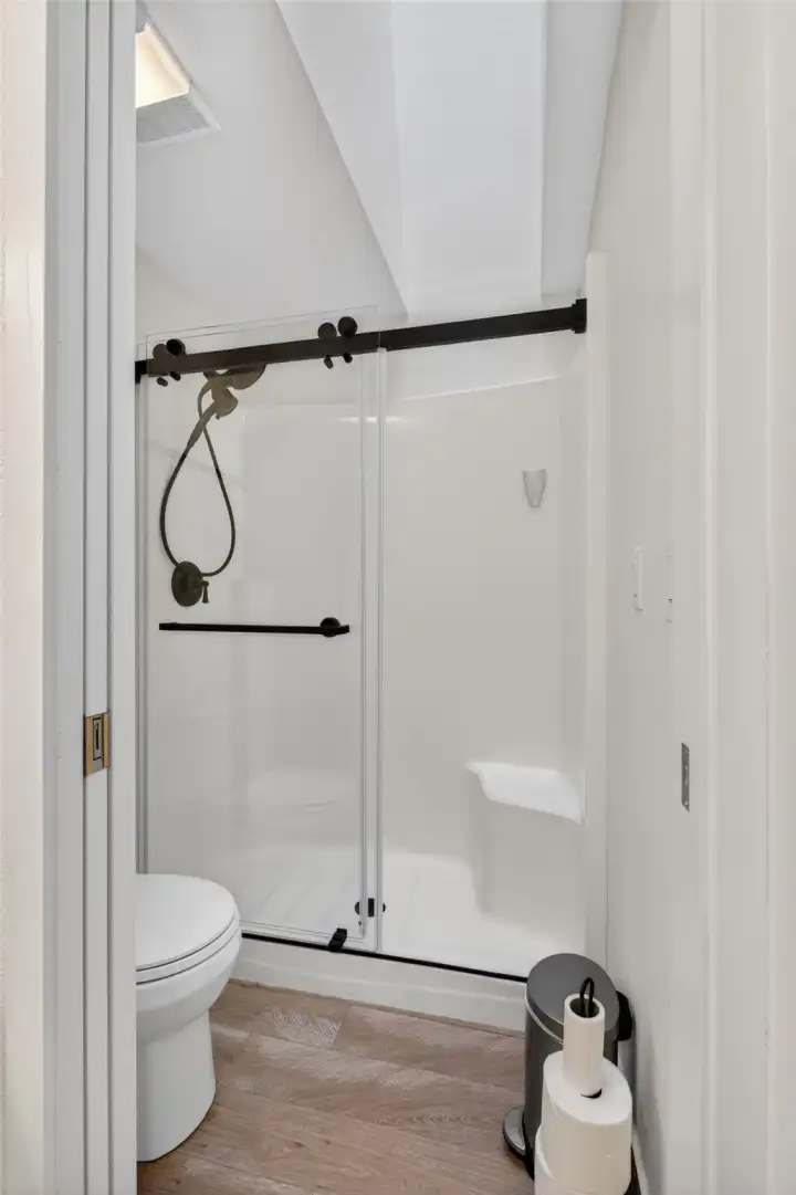 Shower room off primary bedroom.