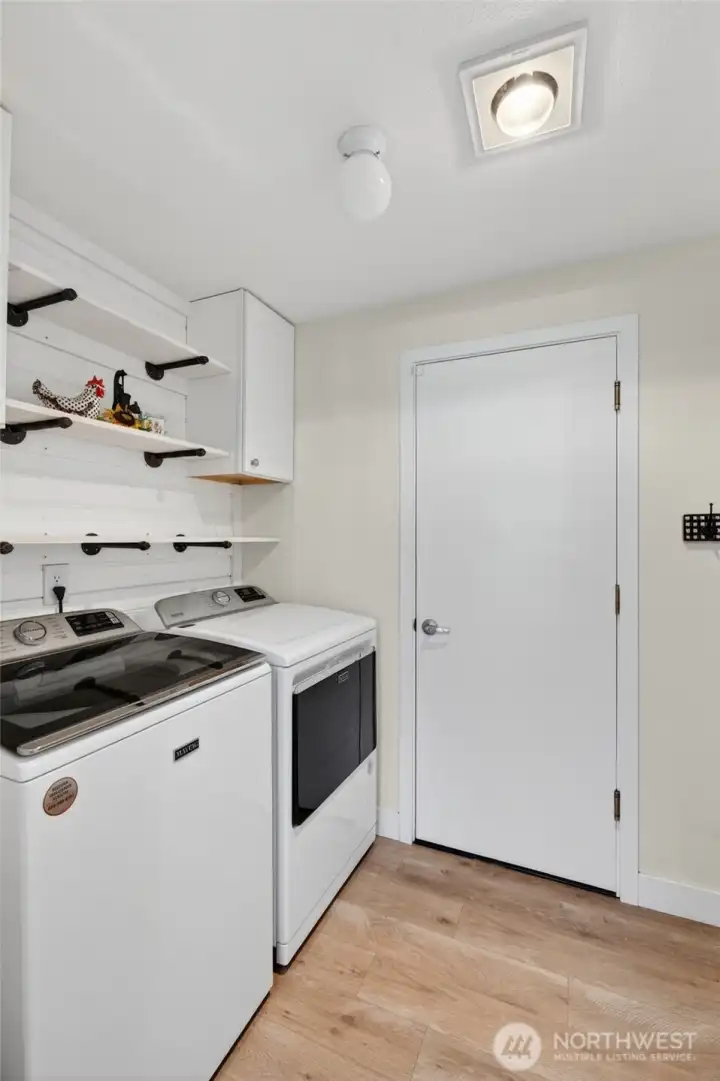 Laundry room with garage access.