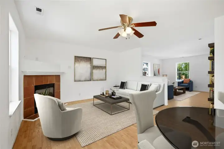 The open design keeps the home feeling connected while offering distinct living zones. [Photo is virtually staged.]