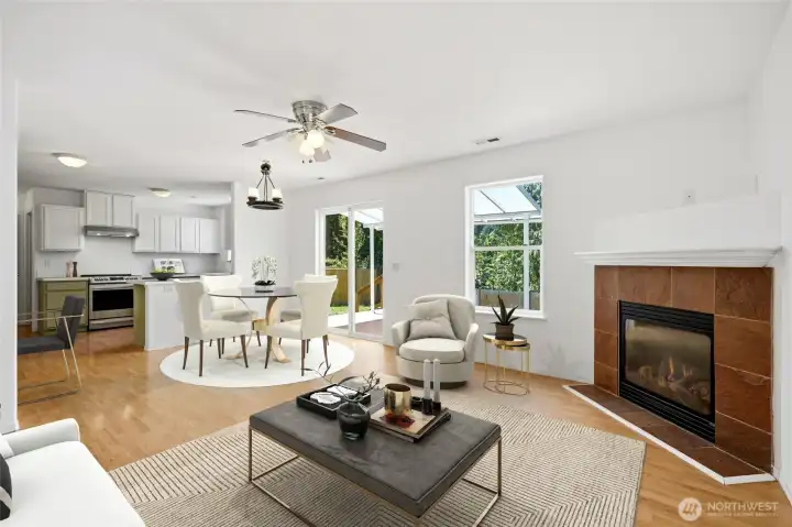 Warm hardwood flooring provides an inviting first impression. [Photo is virtually staged.]