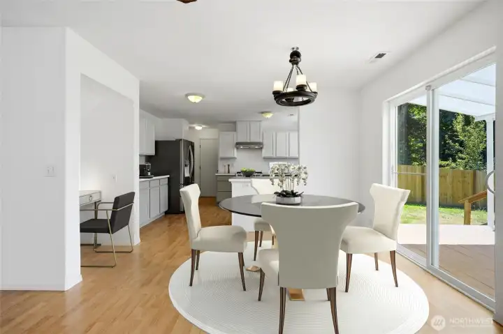 Ideally situated between the kitchen and family room for easy everyday living. Little nook perfect for an office space or cook's corner. [Photo is virtually staged.]