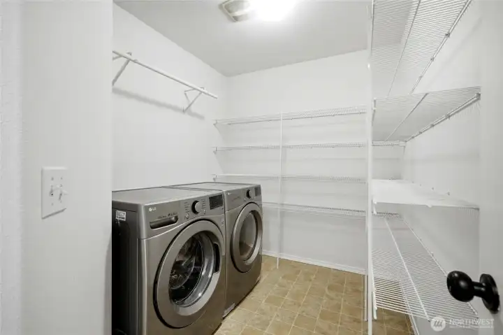 The oversized utility room creates the ultimate everyday drop zone. Ample pantry storage keeps everything organized and within reach. Plenty of space for laundry, storage, and daily household essentials.
