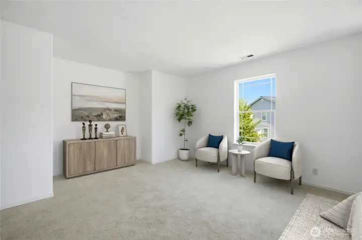 Rarely do you find a primary bedroom this spacious—comfortably fitting a king-sized bedroom suite while leaving plenty of room for a private sitting area or reading nook. [Photo is virtually staged.]