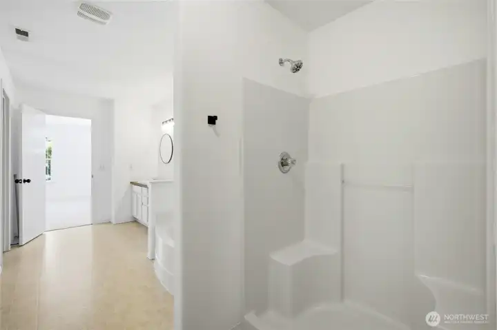 A beautifully designed retreat that complements the spacious primary suite.