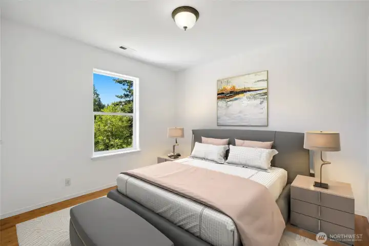 Two additional bedrooms offer comfortable accommodations for family or guests. [Photo is virtually staged.]