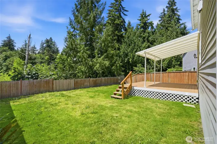 Backing to a protected NGPA greenbelt, the backyard offers exceptional privacy.