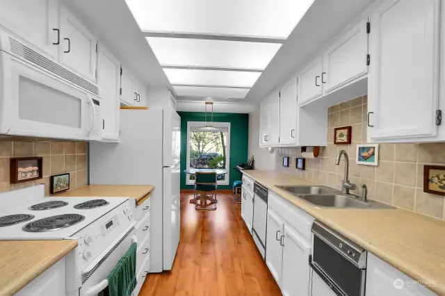 Bright Galley Kitchen with existing appliances