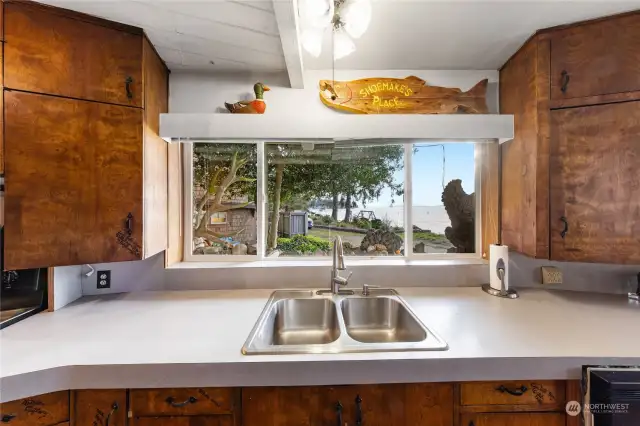 Water, islands & Olympic Mountain view from the kitchen sink.