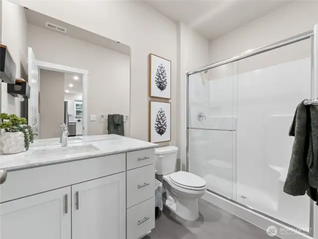 Bath downstairs with shower. Pictures are for representational purposes only, colors and features may vary.