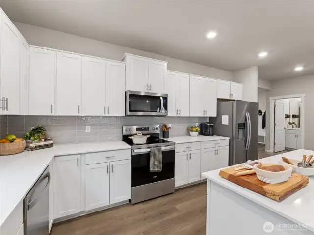 Quartz countertops are an included feature. Pictures are for representational purposes only, colors and features may vary.