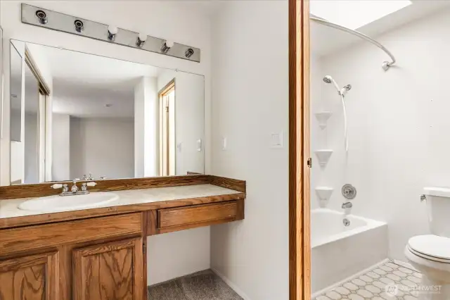 Primary vanity and bathroom