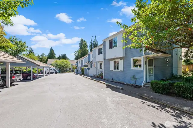 Condo complex entrance with 10 units and covered parking