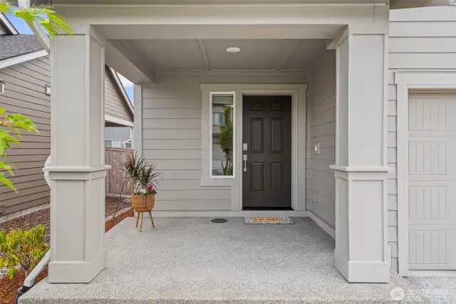 Covered front porch brings you into the main floor entry.