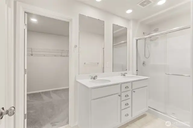Primary bathroom with double sinks.