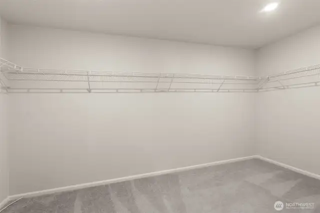 Primary closet, so much space for all your clothes.