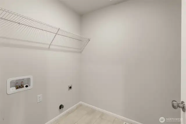 Large laundry room located upstairs for ease.