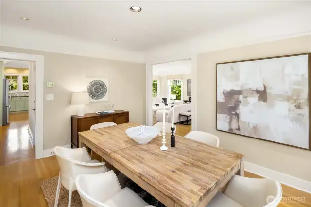 The dining room connects to the living room through a wide doorway (with original glass doors stored in the lower level storage area, if desired) and flows easily into the classic butler's pantry adjoining the kitchen.