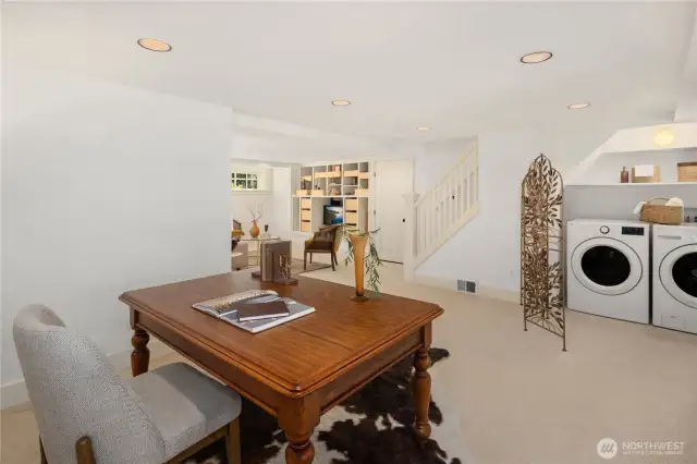Lower level also includes laundry facilities with storage.
