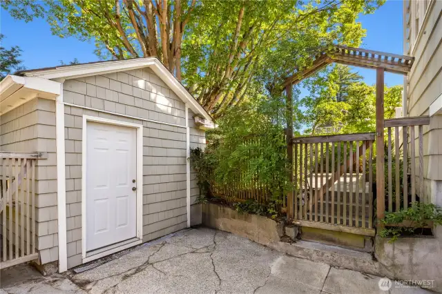 Tucked away behind the garden gate—your very own workshop awaits.