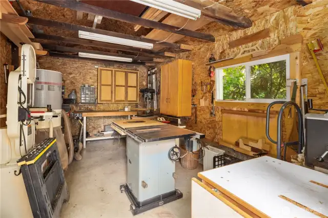 From saws to sanders, this workshop is set up for serious craftsmanship. All tools and items here convey, if desired. If not, dream away what this little building could be for you!